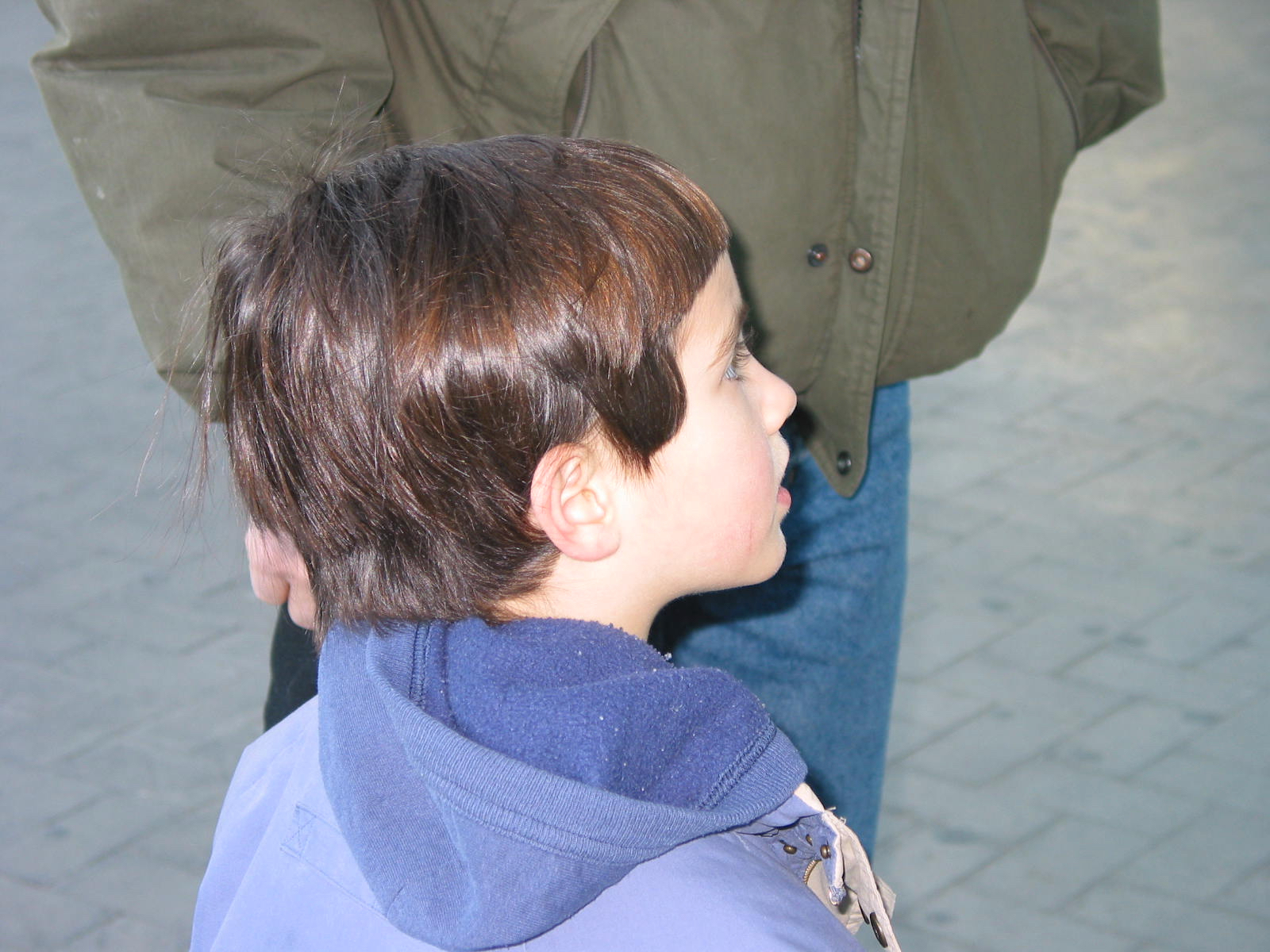 photo of a young girl with dark brown hair and a purple hoodie